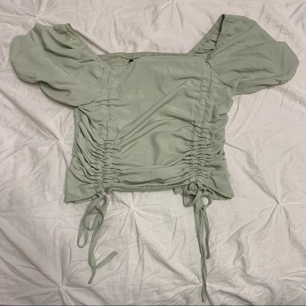 adorable cropped and tied green crop top